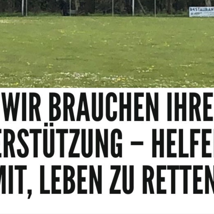 Defibrillator und Sponsorentafel TuS Halbemond