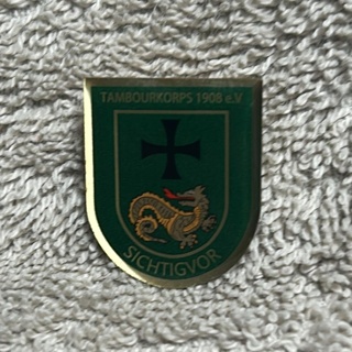 Ansteck-Pin mit Tambourkorps Logo