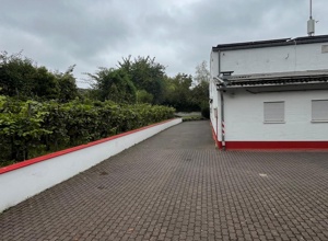 Außenanlage umgestalten und Entwässerung erneuern